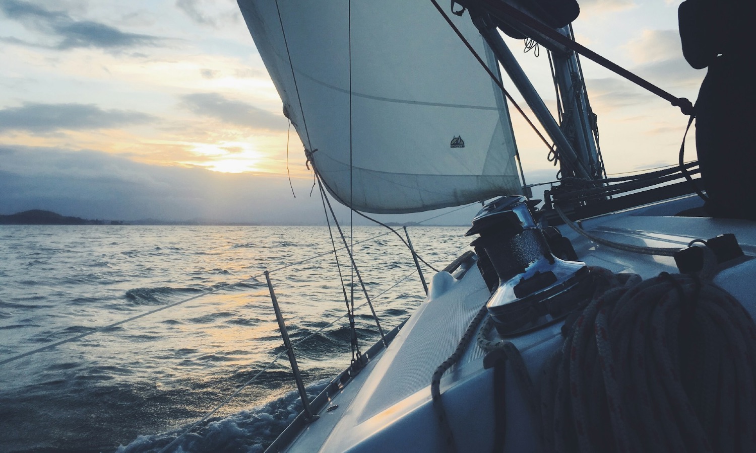 Superyacht at sea at dusk